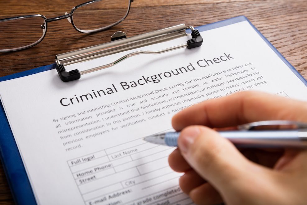 shutterstock_571652542-min criminal background check form image